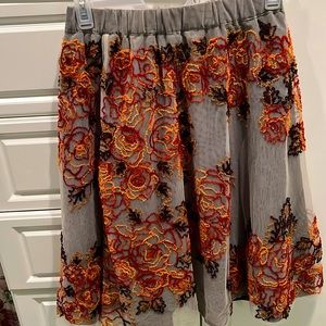 Skirt by Not So Serious, size XZ; black silk lining with netting of grey tulle